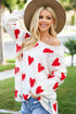 The Athena - Women's Distressed Sweater in Ivory